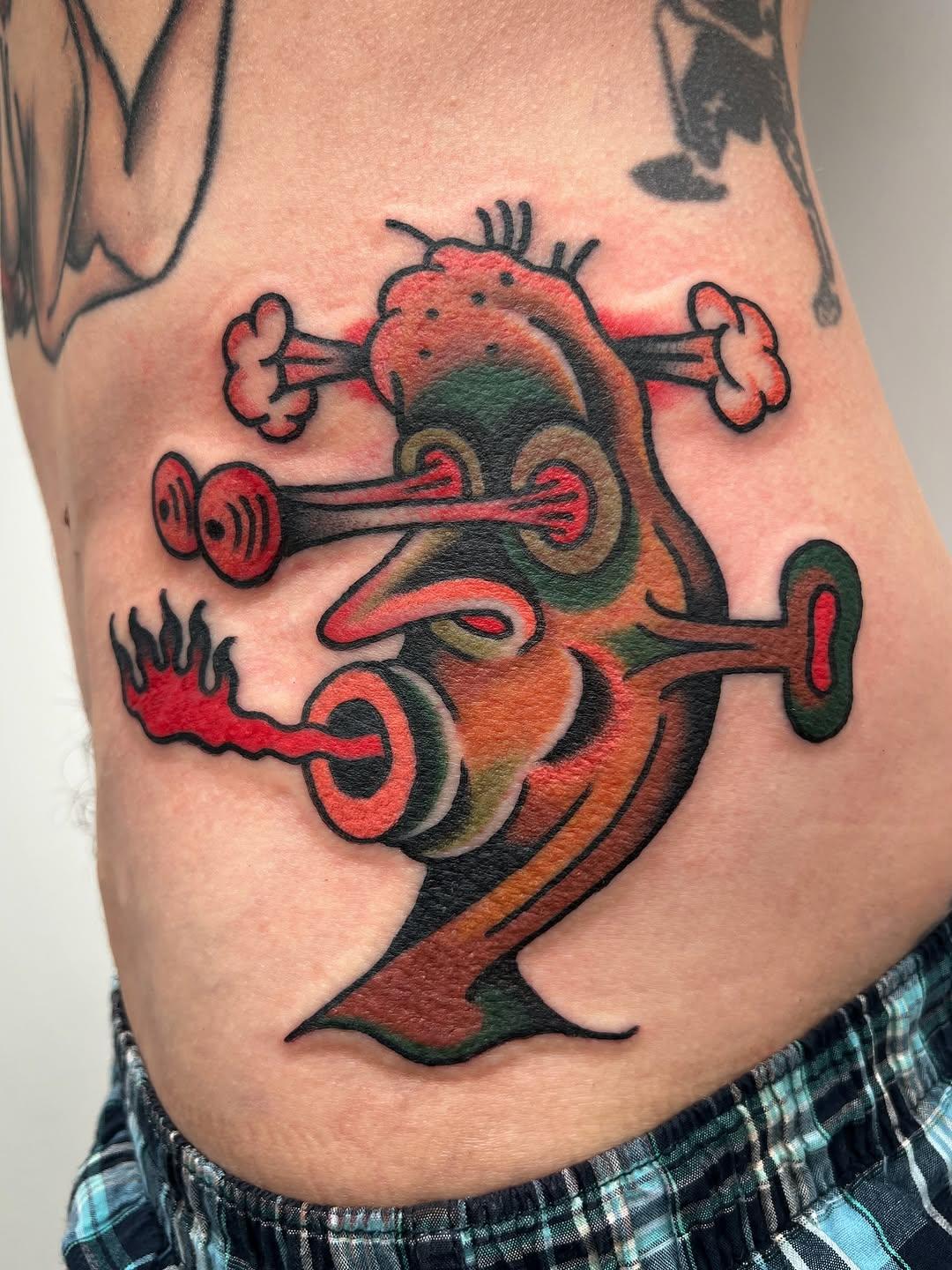 Tatouage Personnage cartoon rouge jambe — graeme.allan