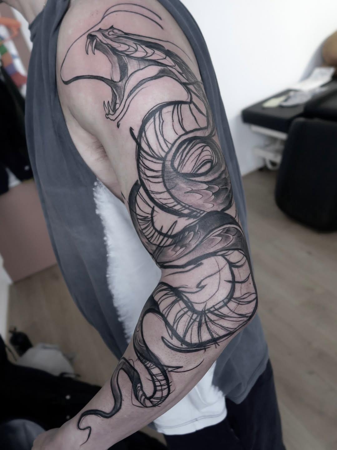 Tatouage serpents entrelacés — knottattoo
