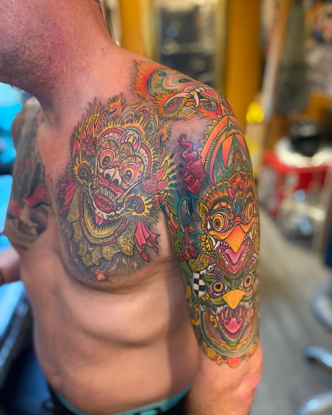 Tatouage Démons balinais épaule-bras — fishermantattooclub