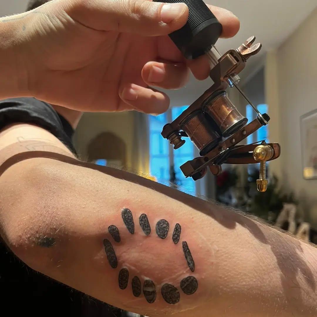 Tatouage Relativité du temps — 10.126.tattoo
