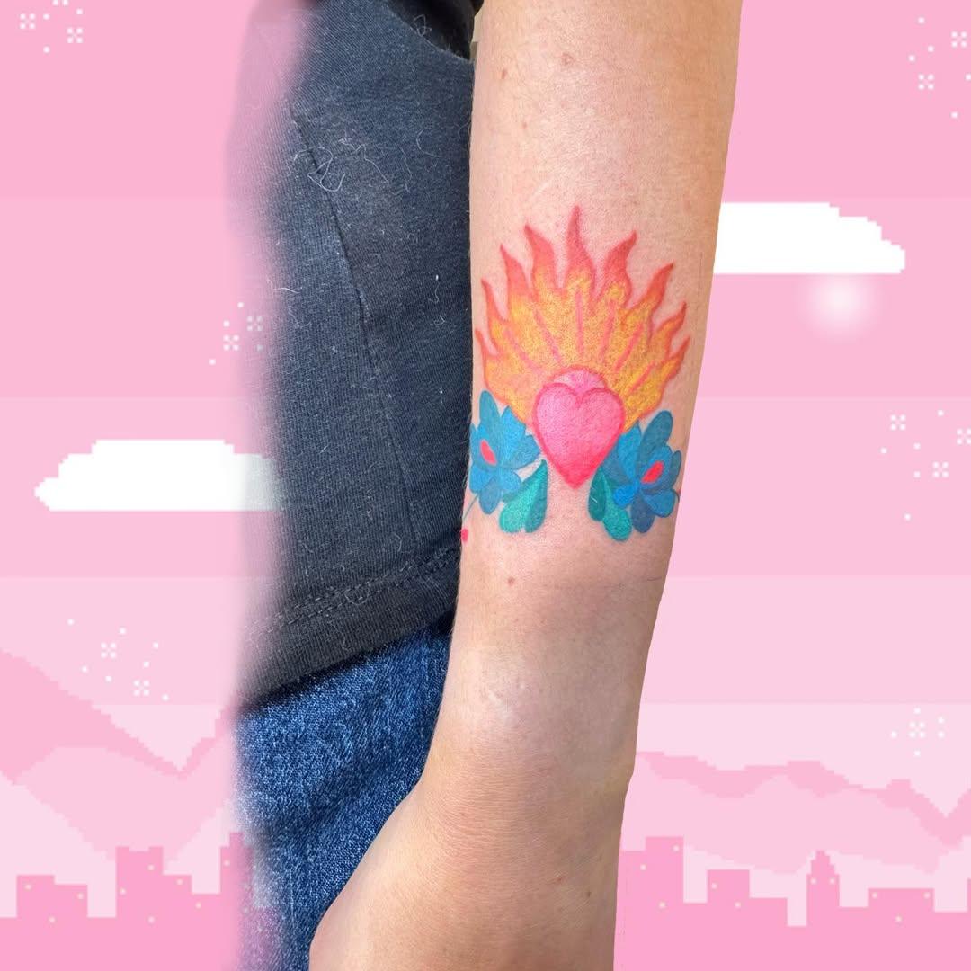 Tatouage cœur enflammé ailes — noemiealazardtatouage