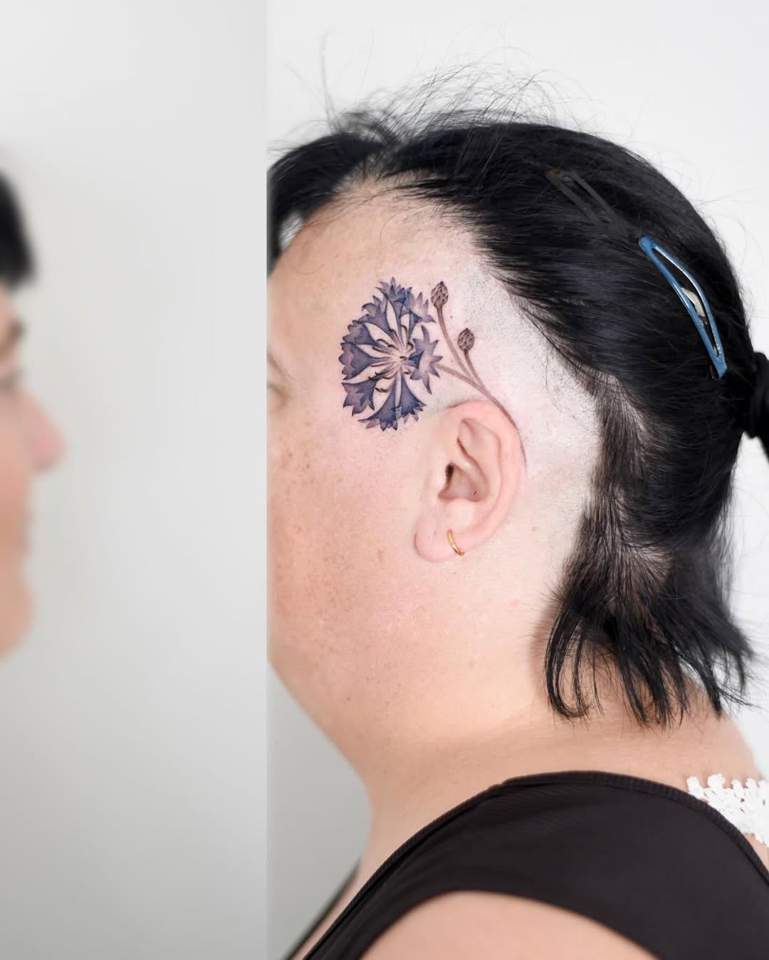 Tatouage Bleuet temple — eloula.tattoo