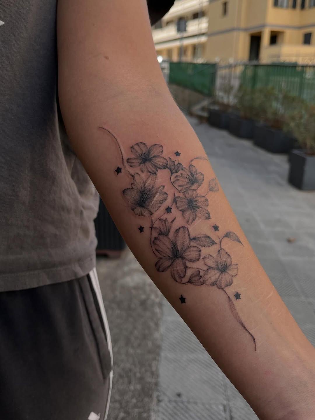 Tatouage floral fleurs de cerisier fine line — _ita.ka