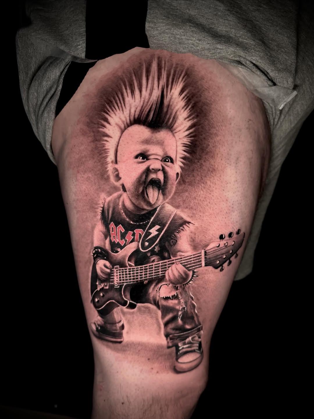 Tatouage bebe rockstar guitare — jeremy_josselin
