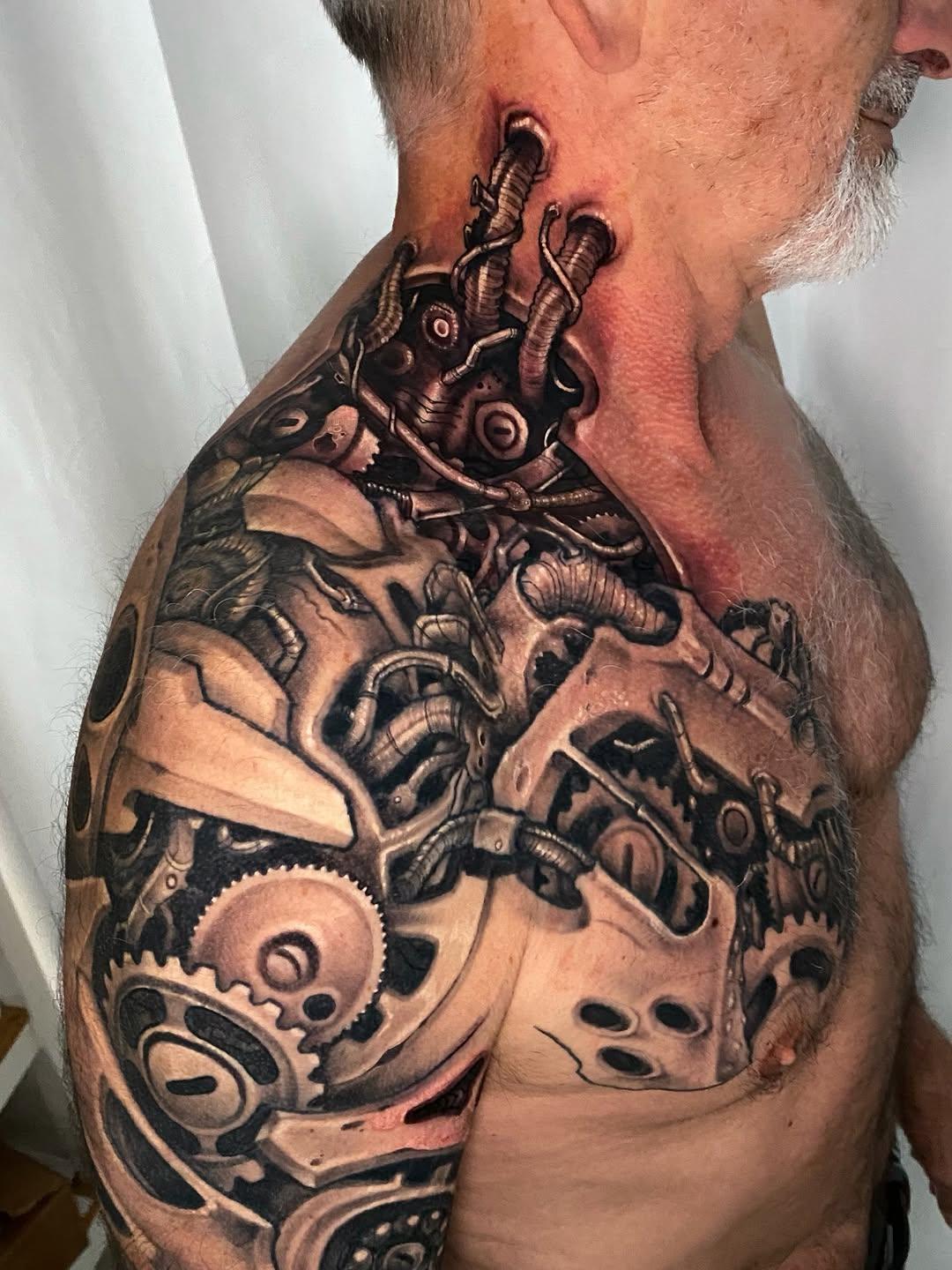 Tatouage biomécanique bras de robot — gromecanique