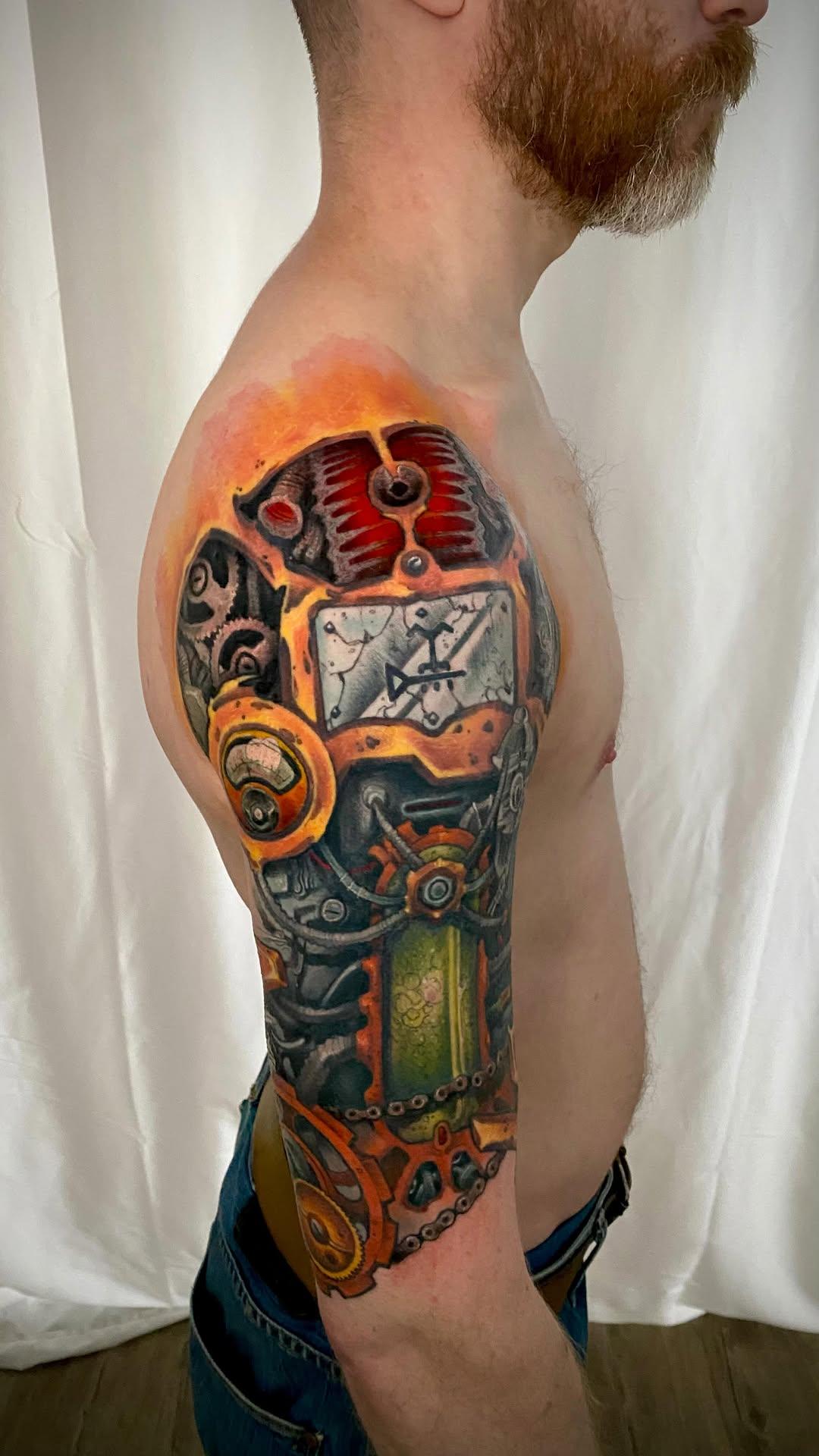 Tatouage biomécanique steampunk couleur — gromecanique