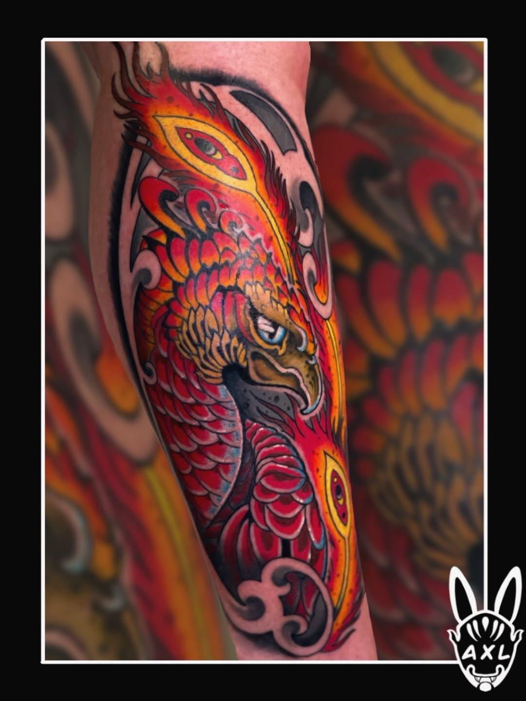 Tatouage phœnix néo-traditionnel couleur — axlt_art
