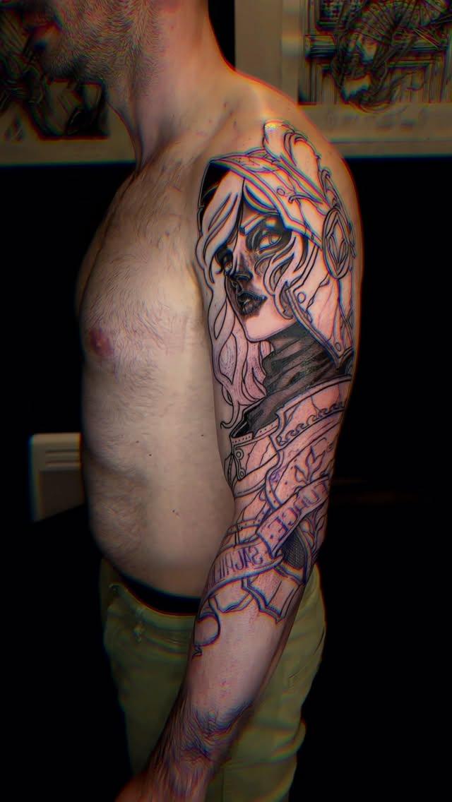 Manchette blackwork guerrière — dorianblind_tattoo