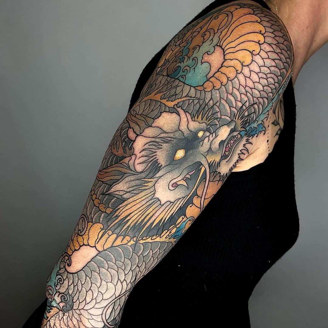 Tatouage blackwork dragon — andymessianttattoo