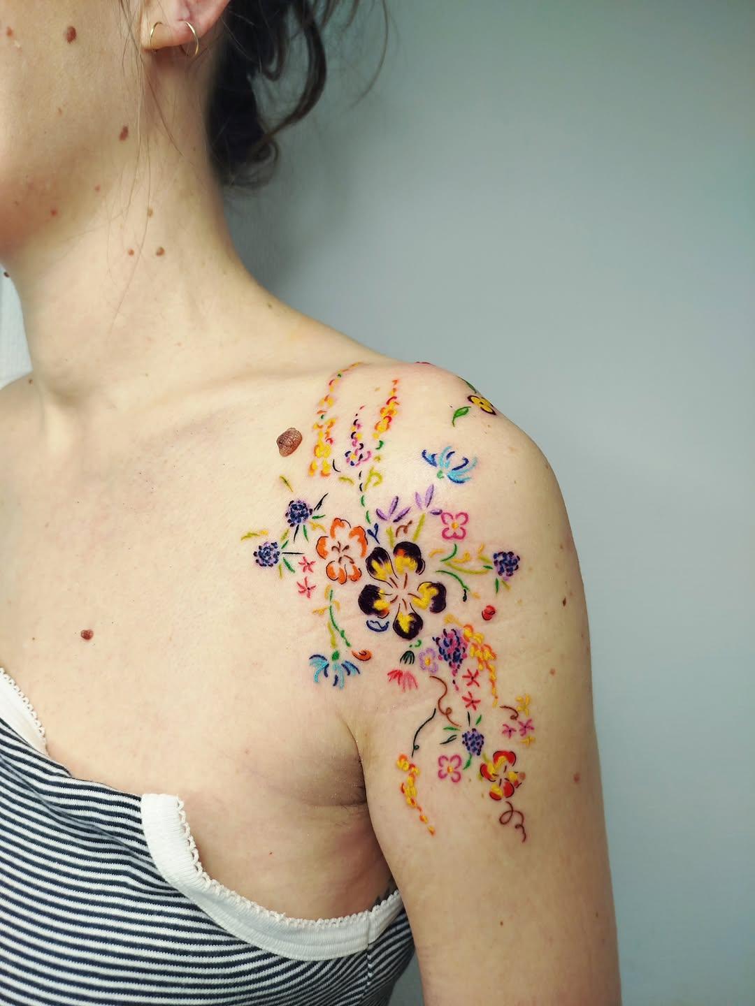 Fleurs colorées rampantes bras