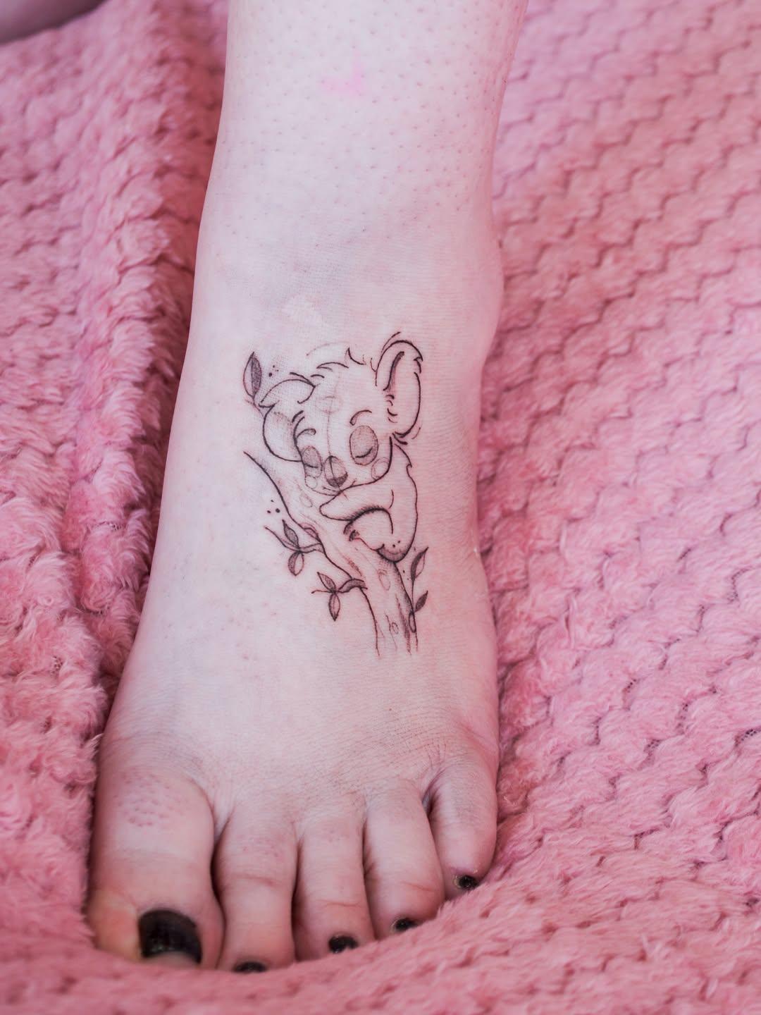 Tatouage Koala sur branche — lencredoz