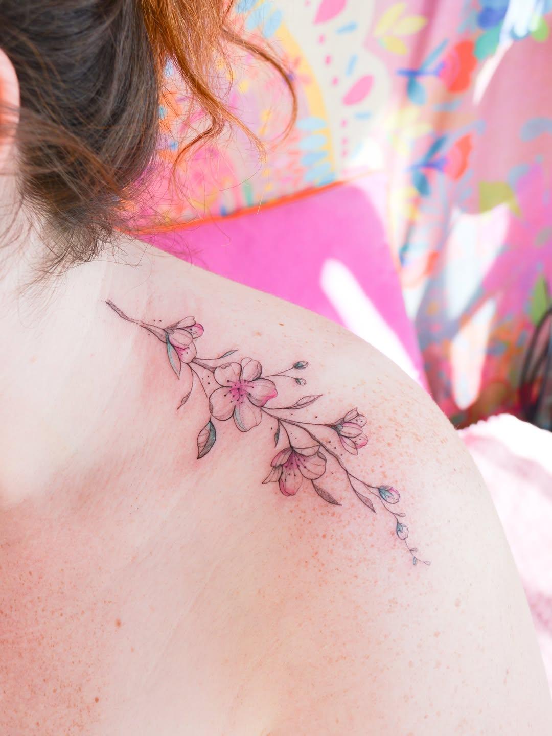 Tatouage Branche de fleurs de cerisier — lencredoz