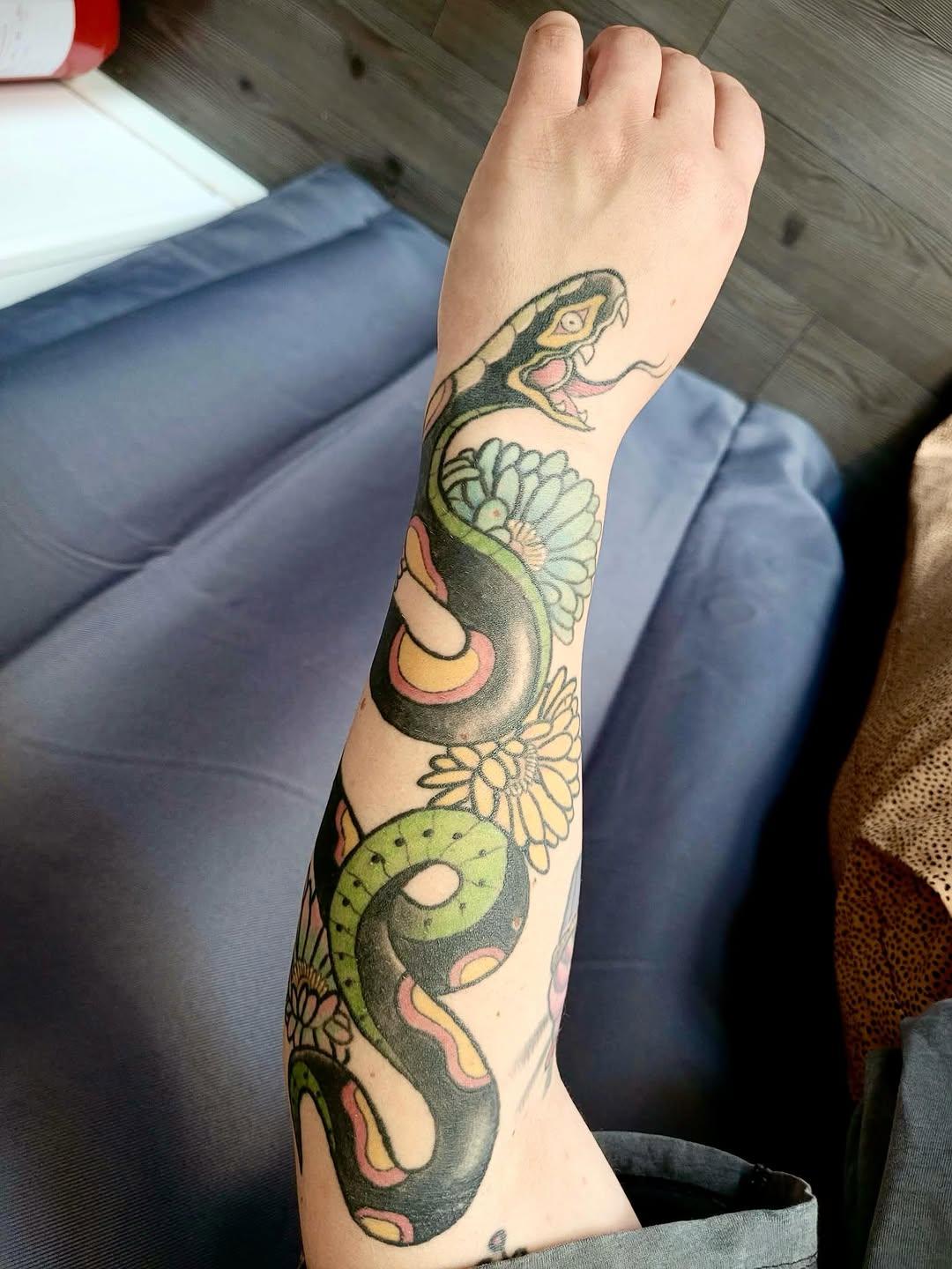 Tatouage Serpents entrelacés — yannickdelaval