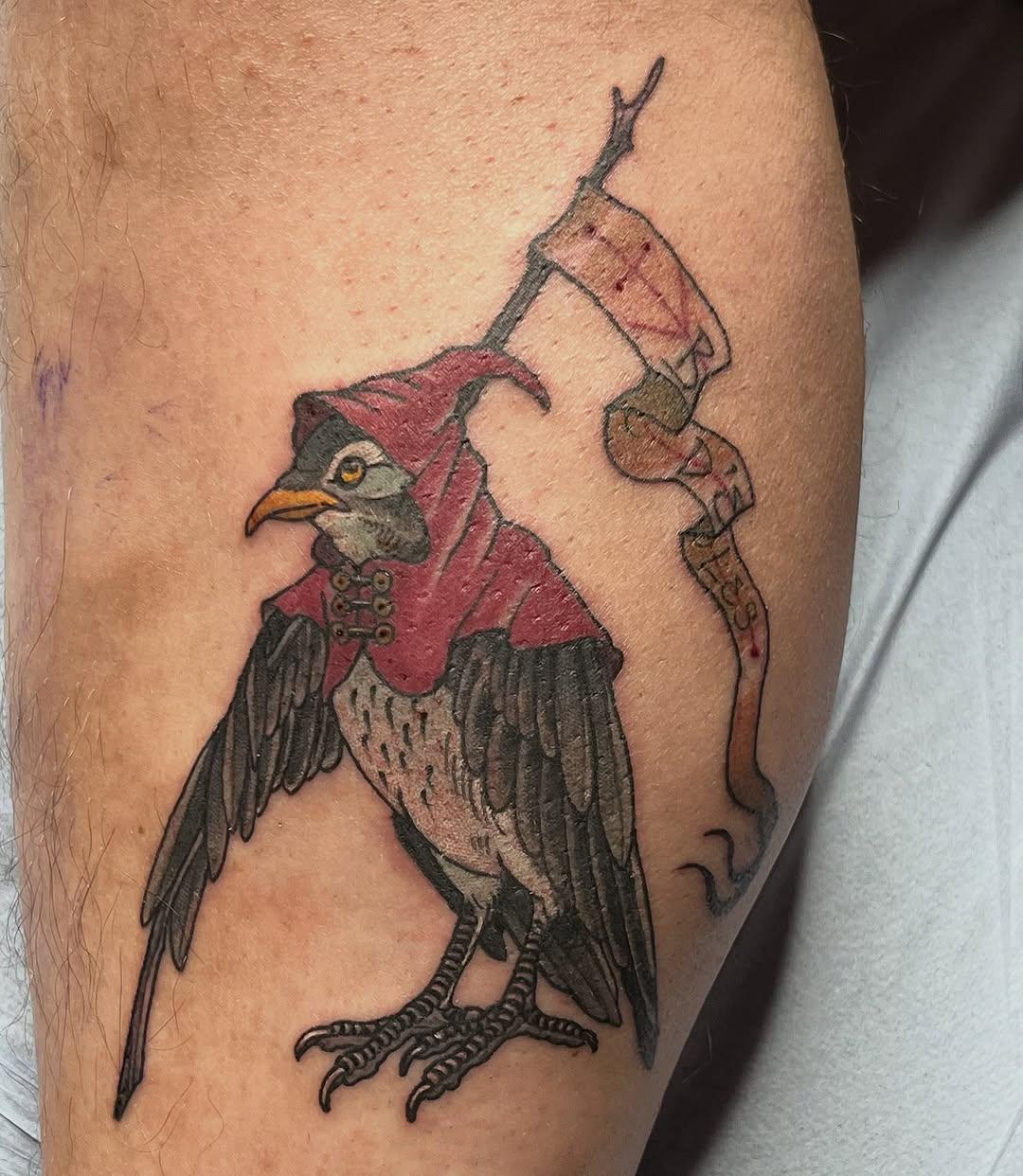 Tatouage Oiseau pèlerin avec cape rouge — rudewaterzooi