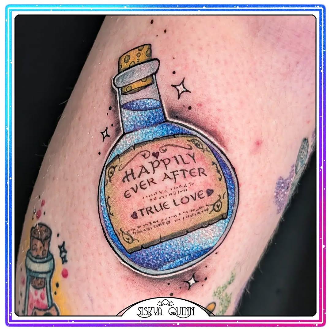 Tatouage fiole paillettes magique jambe — siskya.quinn.tattoo
