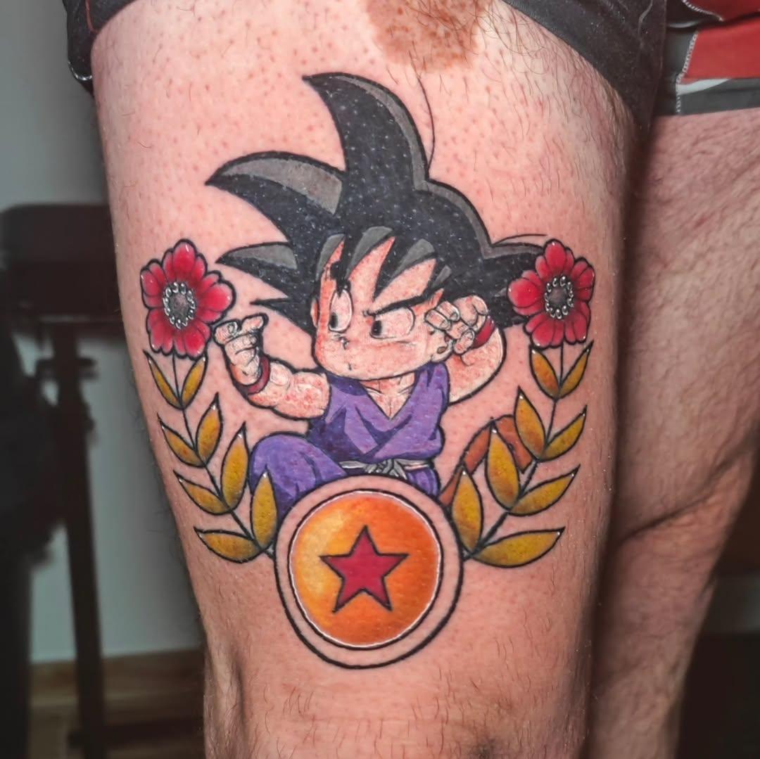 Tatouage Goku Dragon Ball avec fleurs — guibs.r