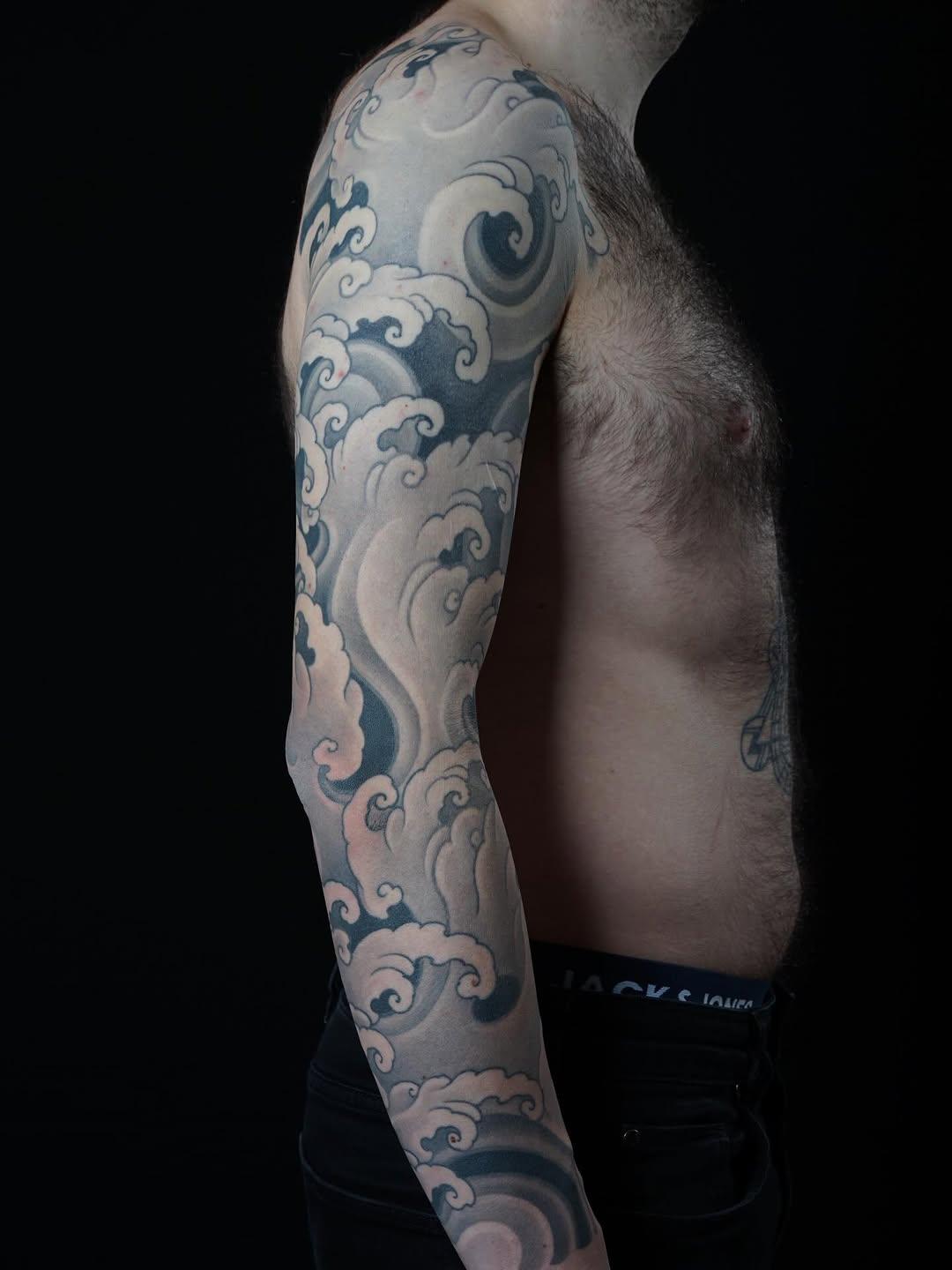Tatouage Vagues japonaises — python.tattoo