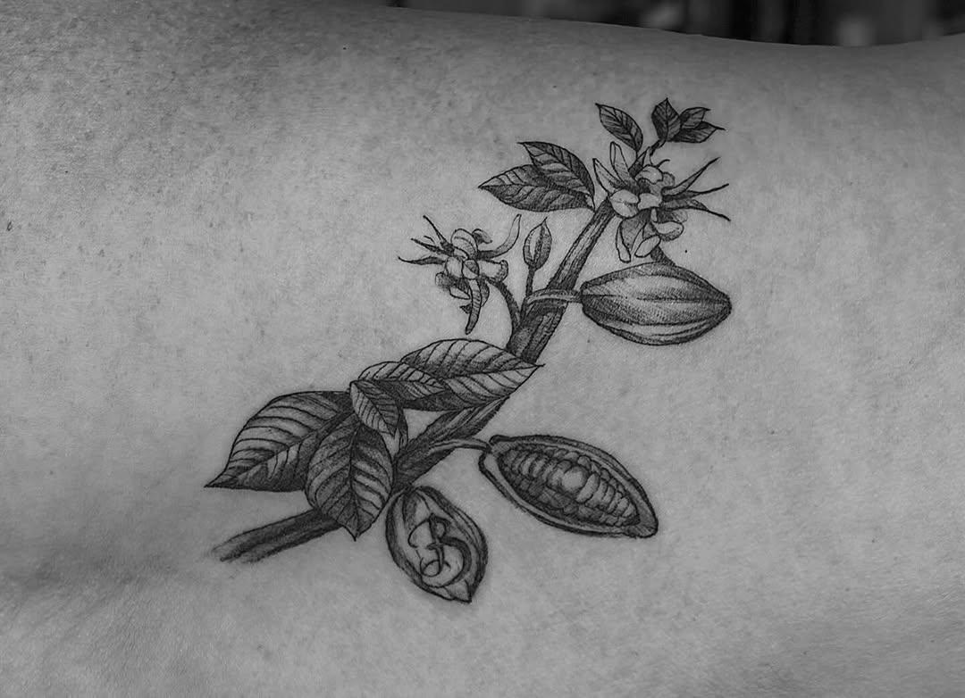 Tatouage branche de cacaoyer et fleurs — audrey_yerdua13