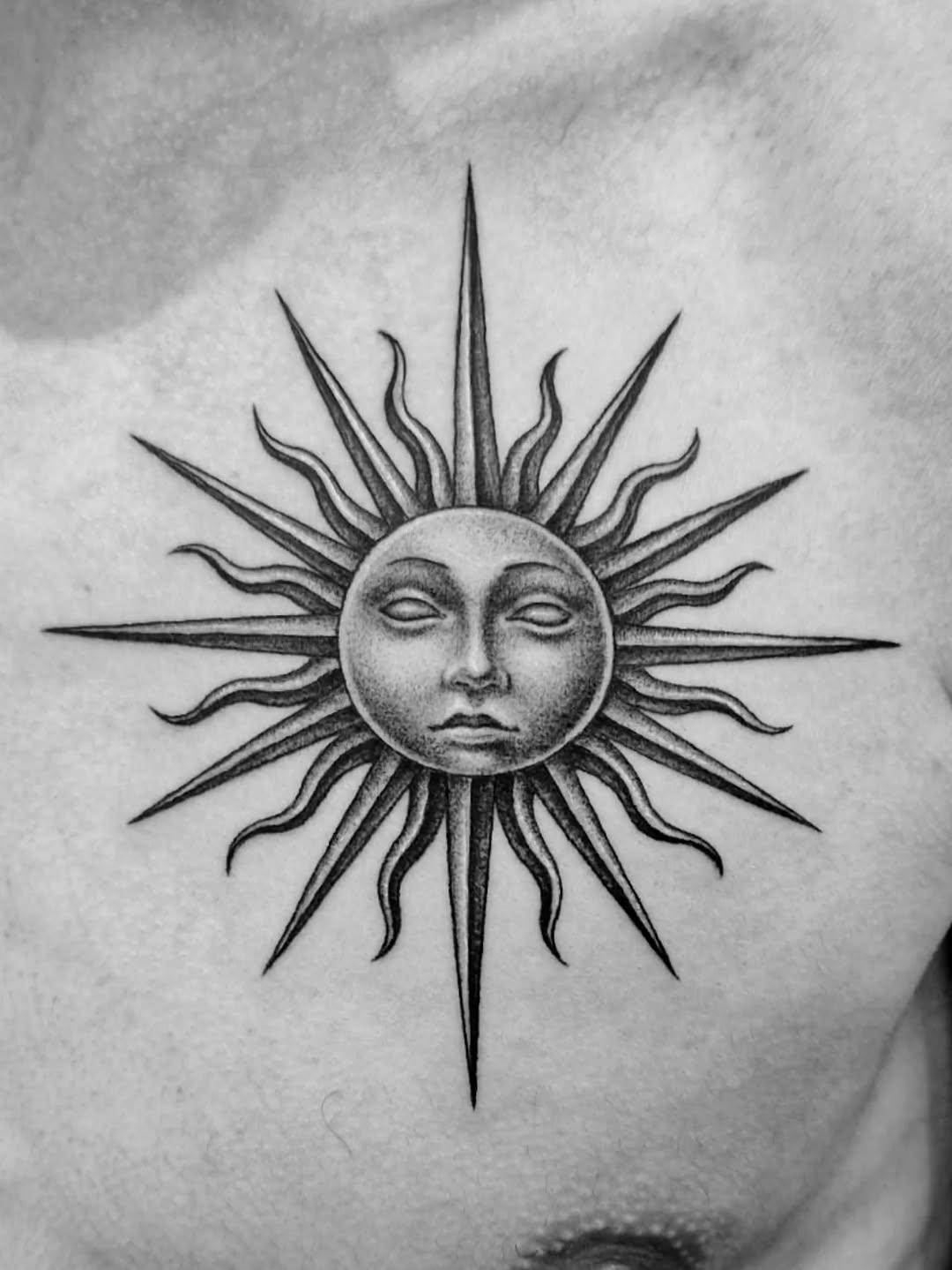 Tatouage soleil visage black & grey dotwork — flovlttt