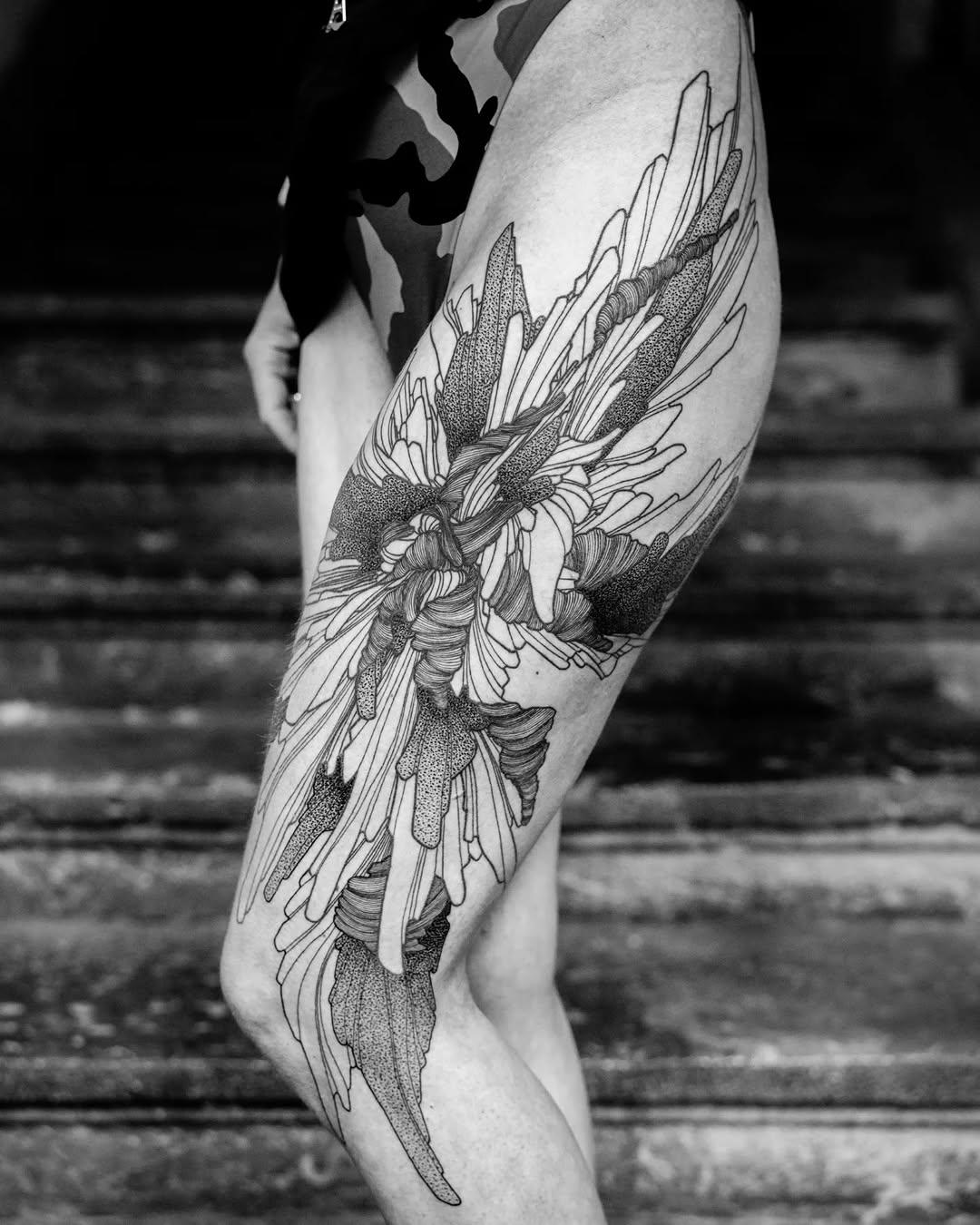 Tatouage fleurs sauvages blackwork — guet